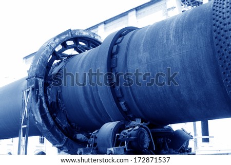 TANGSHAN - NOVEMBER 4: The abandoned rotary kiln in the Qixin cement plant on november 4, 2013, tangshan city, hebei province, China.
