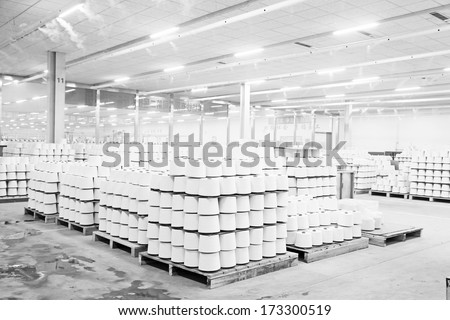 LUANNAN COUNTY - DECEMBER 20: cotton reel thread piled up together in a production workshop, in the ZeAo spinning LTD., on December 20, 2013, Luannan county, hebei province, China.