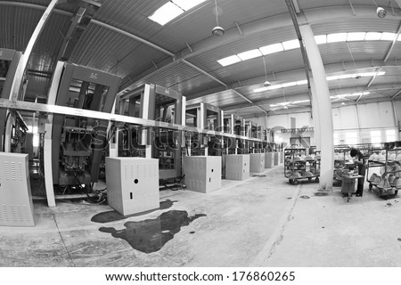 LUANNAN COUNTY - JANUARY 5: Molding workshop machinery and equipment in a warehouse, in the ZhongTong Ceramics Co., Ltd. January 5, 2014, Luannan county, Hebei Province, China.