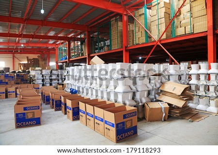 LUANNAN COUNTY, CHINA - JANUARY 5: Ceramic closestool products assemblies in a warehouse, in the ZhongTong Ceramics Co., Ltd. January 5, 2014, Luannan county, Hebei Province, China.