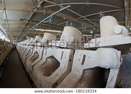 LUANNAN COUNTY - JANUARY 5: Clay parts on the production line, in the ZhongTong Ceramics Co., Ltd. January 5, 2014, Luannan county, Hebei Province, China.