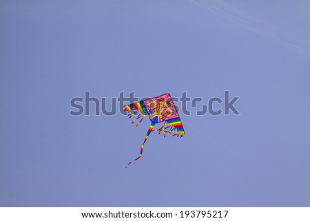 Cartoon characters modelling kite in the sky