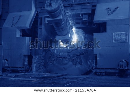 steel mills converter filling materials, closeup of photo