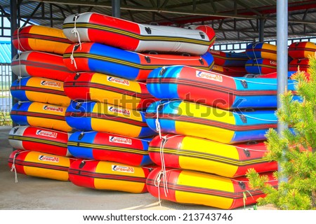 TULIGEN GRASSLAND - JULY 20: inflatable boats heaped in the drifting playground on July 20, 2014, Xilin gol league, Inner Mongolia autonomous region, China.