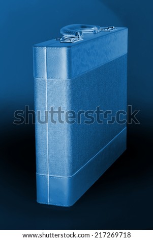 closeup of photo, suitcase on a pure color background