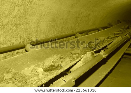 coal conveyor belt in the 70 meters underground in the Kailuan national mine park on october 18, 2013, tangshan city, hebei province, China.
