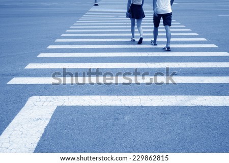 Pedestrians through the zebra crossing