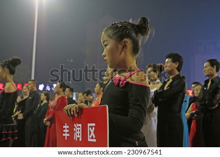LUANNAN COUNTY - SEPTEMBER 20: girl prepared sports dance competition at night on September 20, 2014, Luannan county, Hebei Province, China