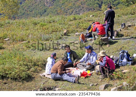 BEIJING - OCTOBER 5: Outdoor travelers have dinner on the hillside, on october 5, 2014, Beijing, China