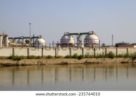 CAOFEIDIAN CITY - SEPTEMBER 27: China's oil storage tanks jidong oilfield company, on september 27, 2014, Caofeidian City, Hebei Province, China