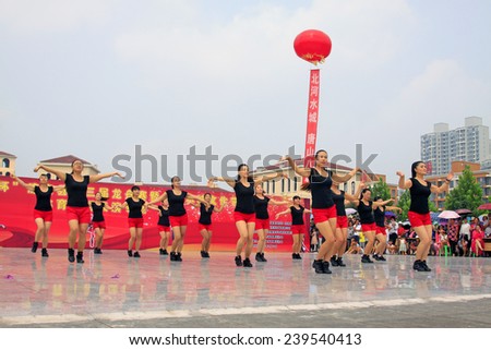 LUANNAN COUNTY - AUGUST 10: fitness dance performances in the open air, on august 10, 2014, Luannan County, Hebei Province, China.