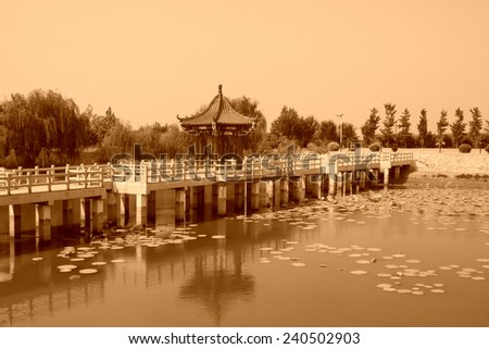 LUANNAN COUNTY - AUGUST 7: traditional Chinese architectural style Bridges and pavilions in the countryside,  on august 7, 2014, Luannan County, Hebei Province, China.
