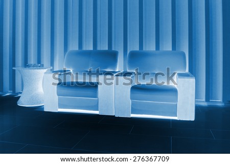 sofa in the hotel lobby, closeup of pictures