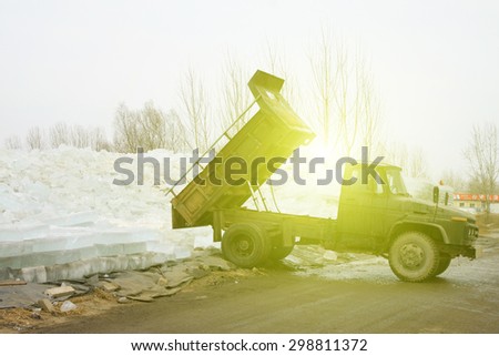 Heavy truck transport ice in the winter, closeup of photo, china