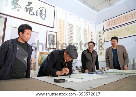 Luannan - April 7: writing calligraphy on April 7, 2015, luannan county, hebei province, China