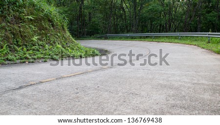 The road curves down the mountain