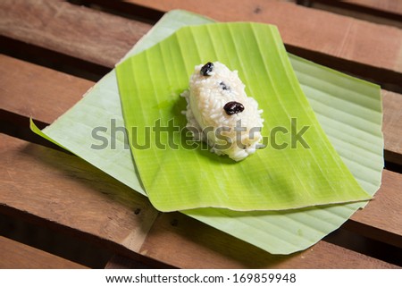 Thai dessert or thai sweet , Hao Tom Mad made from banana and glutinous rice, wrap with banana leaf , In the process of preparation