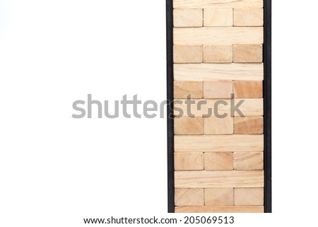 blocks wood game (jenga) with black box isolate on white background.