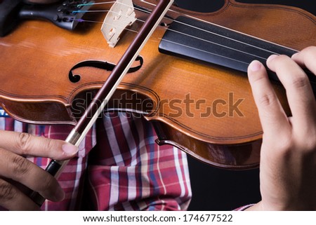 musician playing violin