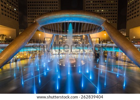 SINGAPORE - MARCH 1, 2015: Night scene of Fountain of Wealth at Suntec city, Singapore. Fountain of Wealth is one of the most famous tourist attraction in Singapore.