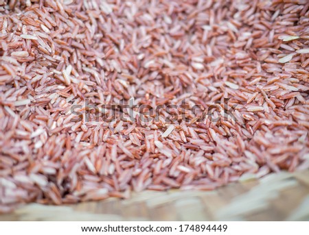 Brown raw rice agricultural product in the basket