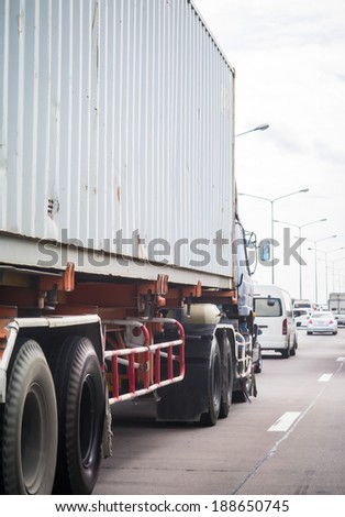 Truck with container driving on the congestion road