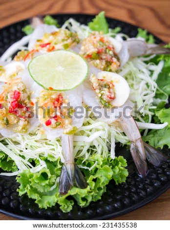 Raw shrimp in fish sauce, the Thai spicy appetizer, closeup shot