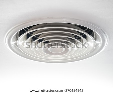 Circular air ventilation duct on the ceiling in white