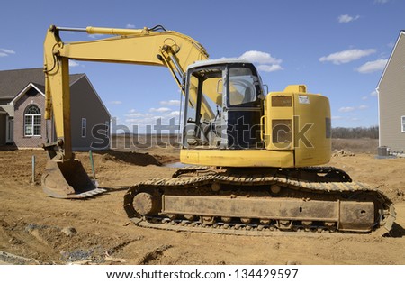 backhoe, a type of heavy duty construction equipment used in excavation