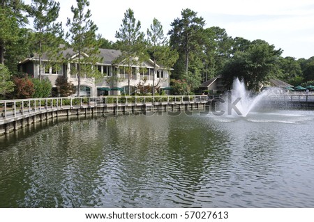 Lagoon and fountain by a resort building.  The resort is on Hilton Head Island in South Carolina.