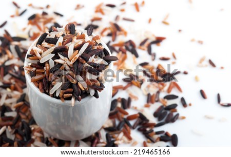 Food background with of rice variety . rice mixture. brown rice, black rice, white rice.