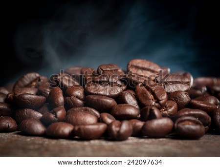 Coffee beans roasting with smoke