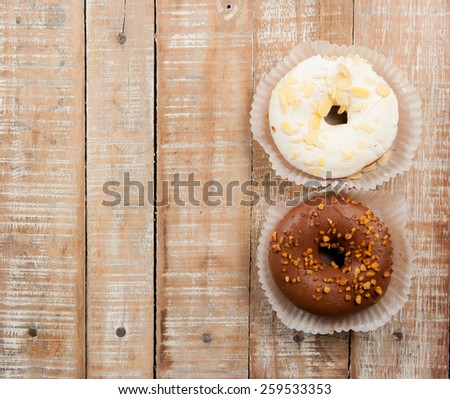 Sweet donut for a great morning breakfast on wood