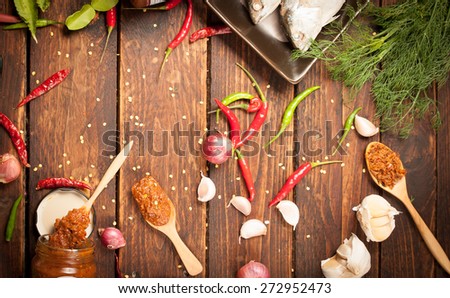 thai kitchen food spice herb pepper grass red onion garlic chilly ginger for cooking original eastern food syle on wood