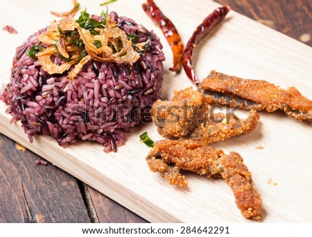 Fried fish and Brown rice in Thailand food