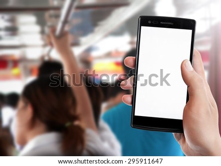 Man\'s hand holding mobile smartphone,People going by bus background