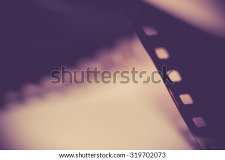 Close-up Film of a roll 35 mm photographic film; vintage tone style,soft focus