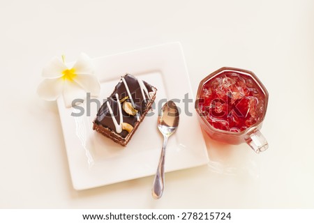 Chocolate cake with fruit juice