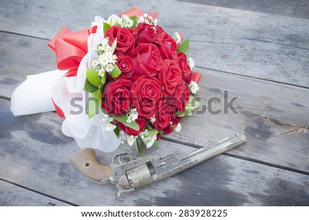 Old gun and roses