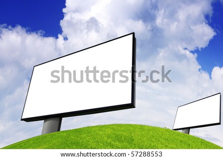 Advertising billboard on green field