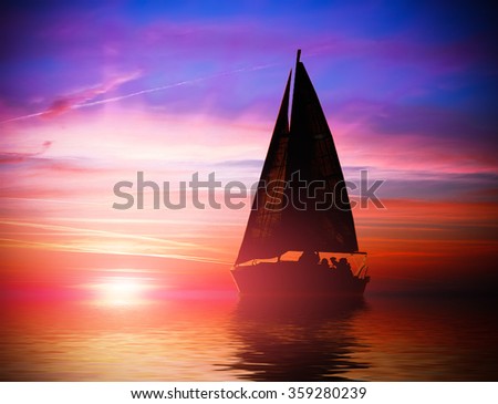 Small sailing yacht floating on horizon line