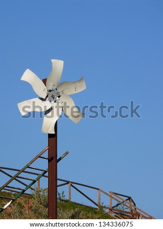 simulated windmill made of recycled material