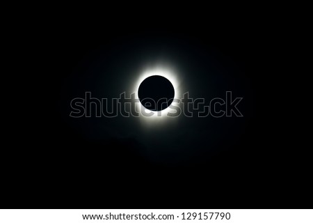 The moon completely covers the sun during a total solar eclipse.  This amazing event can be seen approximately ever 18 months from somewhere on Earth.