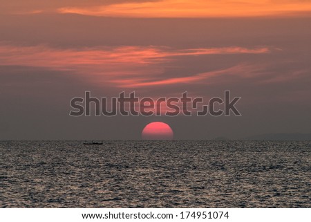 The sun sets on a small fishing boat in the Mergui Archipelago in Myanmar. This rarely visited area harbors a wealth of uninhabited and untouched islands.