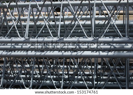 Steel pipes & bar for telecommunication tower in warehouse.