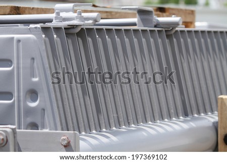 Heat radiator fin for high voltage transformer