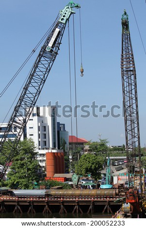 NONTHABURI -THAILAND - MAY 31 :  Concrete bridge across Chaophraya river under-construction of its deep long pile foundation on May 31, 2014 in Nonthaburi, Thailand
