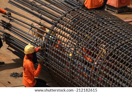 Bridge construction under performing the steel reinforcement of piling work.