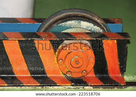 Steel roller on the rail for transportation in heavy industrial.