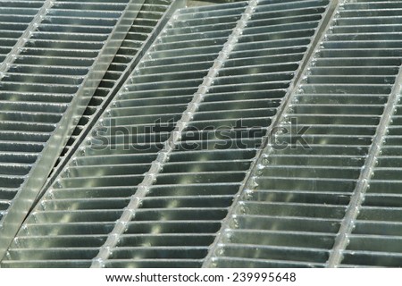 Galvanized steel covers for drainage system or cable trench.
